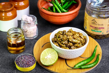 Unlike masala chopped chillies, this recipe is inspired from Bengal's famous pickle Sarson Batta. Mild pungent flavour of mustard seeds and spiciness of small thin chillies makes it a perfect blend. It's a treat for those, who loves something hot on their plate.