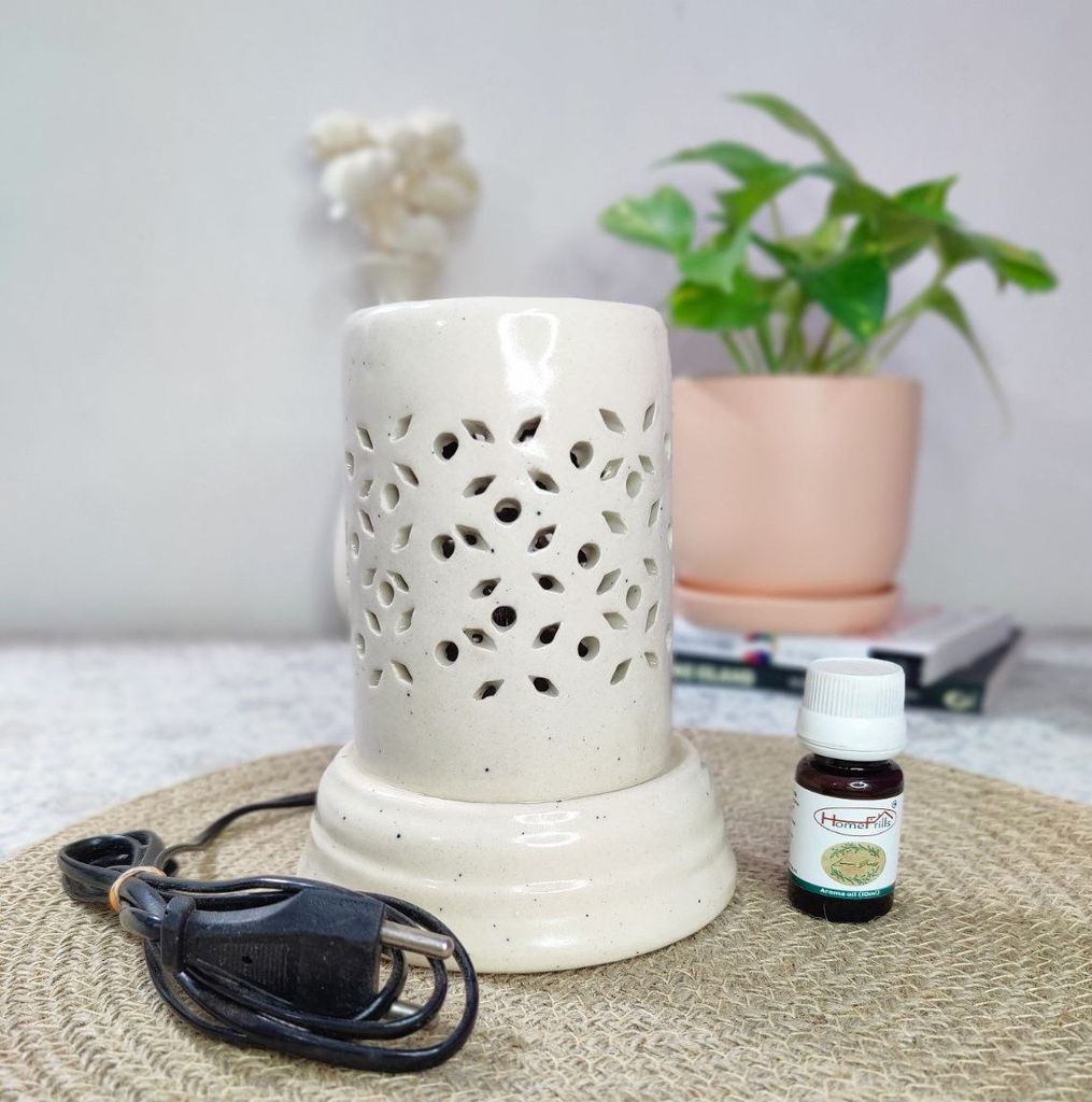 Homefrills Ceramic Cylindrical Shape Electric Aroma Diffuser Oil Burner with 10 ML Lemongrass Aroma Oil for Home/Office & Spa for Aromatherapy/Oil Burners Colour -White (Size-15*12*7 cm)