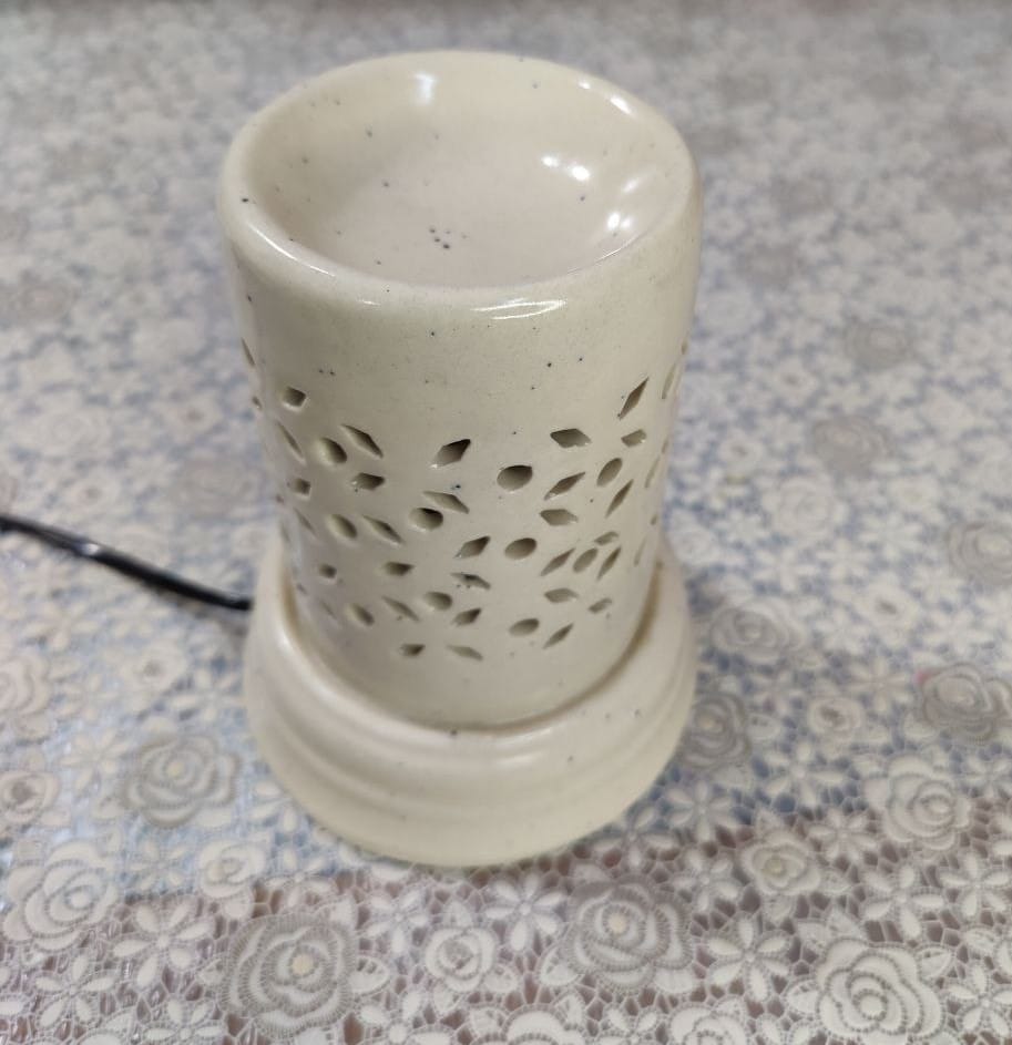 Homefrills Ceramic Cylindrical Shape Electric Aroma Diffuser Oil Burner with 10 ML Lemongrass Aroma Oil for Home/Office & Spa for Aromatherapy/Oil Burners Colour -White (Size-15*12*7 cm)