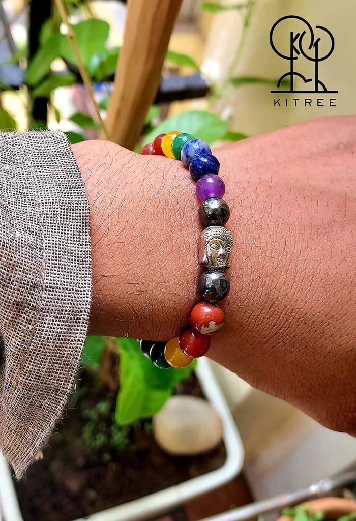 KITREE ENERGISED NATURAL SEVEN CHAKRAS CRYSTAL BRACELET WITH BUDDHA 8MM ROUND SHAPE FOR UNISEX (MULTI COLOR)