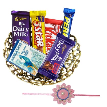 Loops n Knots Golden Delights Gift Hamper: 5 Chocolates in a Golden Basket with 1 Pink Paper Rakhi and Roli Chawal for Brother