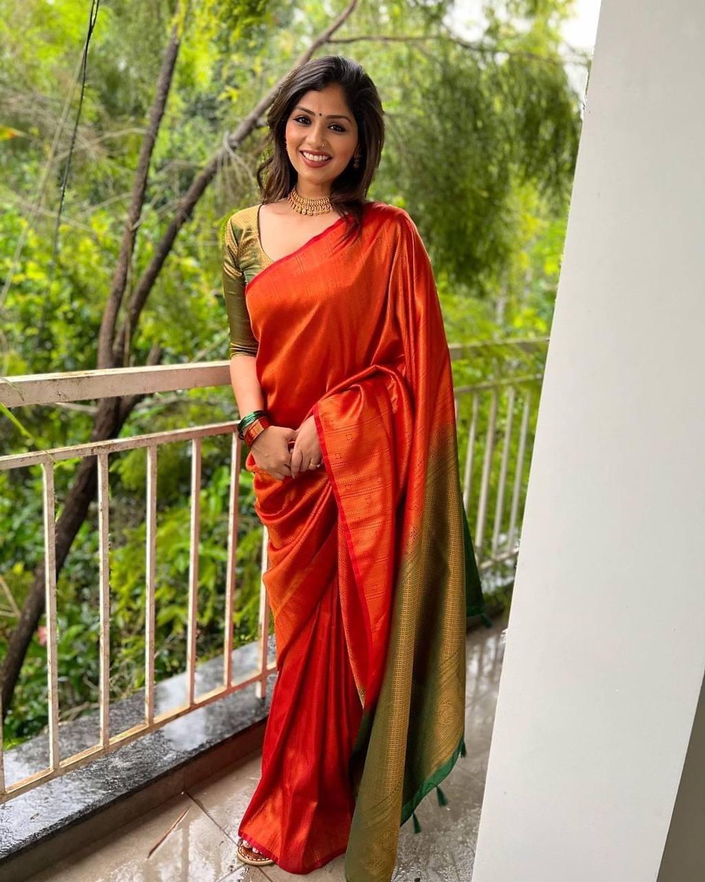 orange saree with dark green blouse