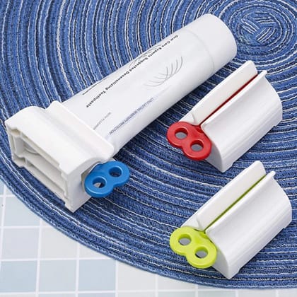 URBAN CREW Rolling Tube Toothpaste Squeezer Toothpaste Seat Holder Stand Rotate Toothpaste Dispenser for Bathroom - 1 pc (Random Color)