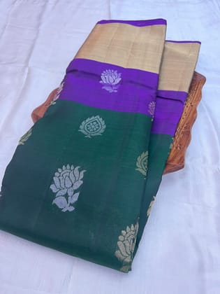 Soft silk: Violet and bottle green colour double butta designs in silver and copper Zari saree