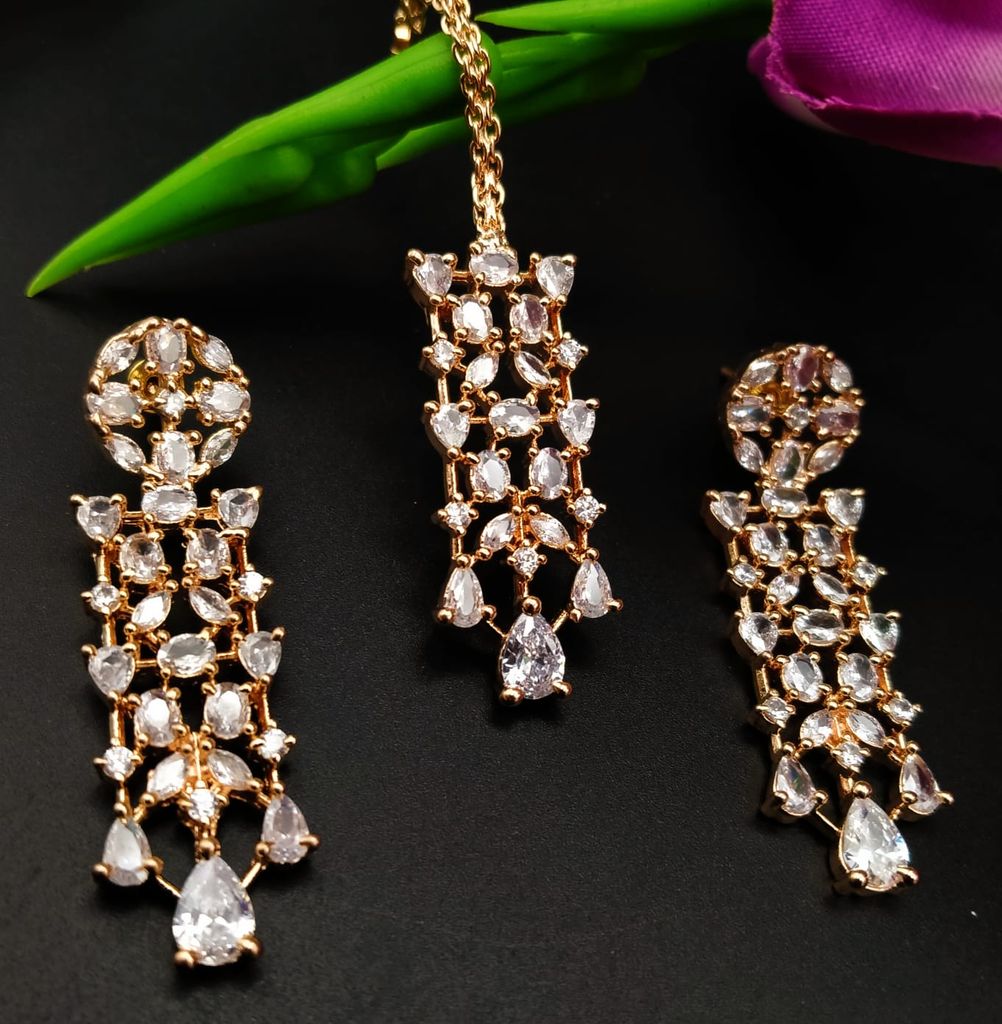 Party wear rose gold jewellery with earings & mangtika - Jewellery Sets | Buy online on ZillyBuy
