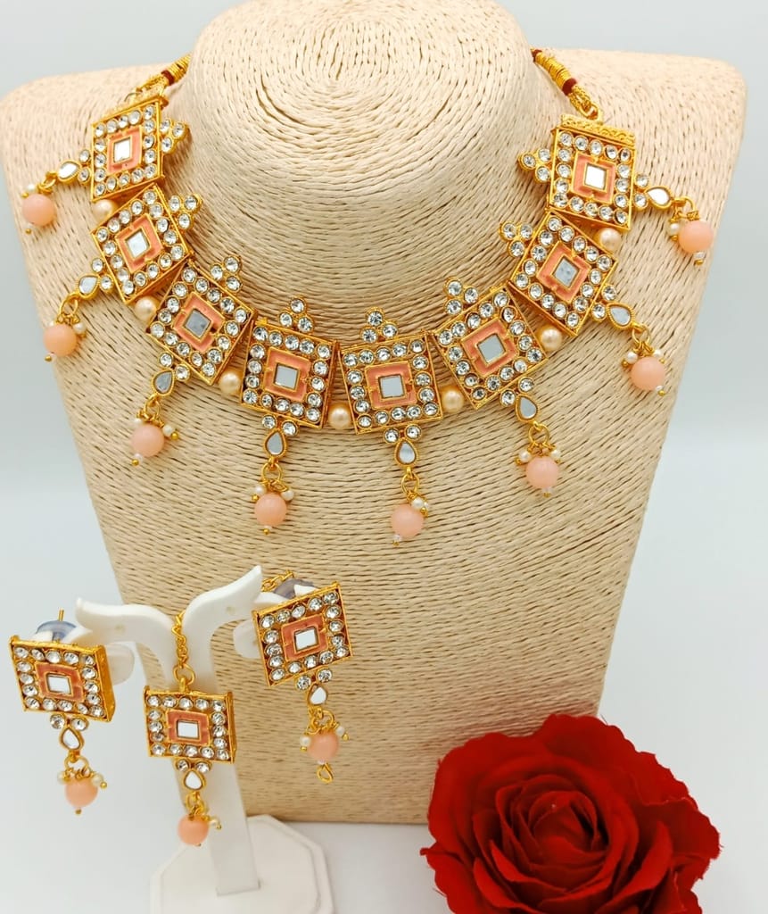 Party wear Peach Meenakari gold jewellery set with earings & mangtika - Jewellery Sets | Buy online on ZillyBuy