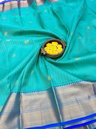 Light Sea Green Color Pure Silk Saree Has Vaira Oosi Line Checked & Double Butta Design with Unstitched Blouse