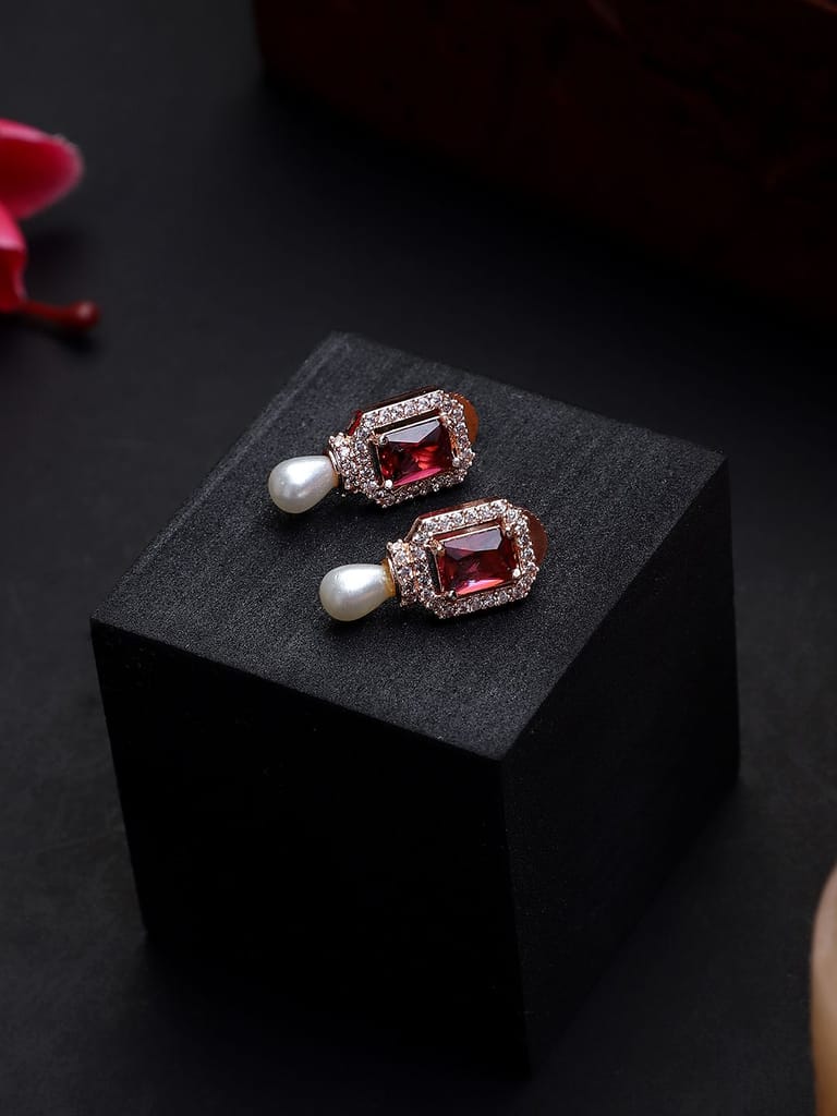 Red Stone American Diamond Rose Gold Plated Earrings - Earrings | Buy online on ZillyBuy