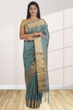 Teal Green Linen Saree with Embellished Design