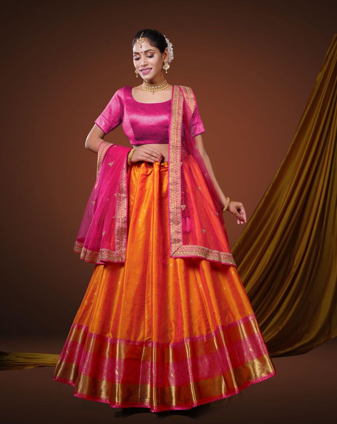 Orange And Rani Banarasi Silk Semi-Stitched Half Saree With Unstitched Blouse And Dupatta