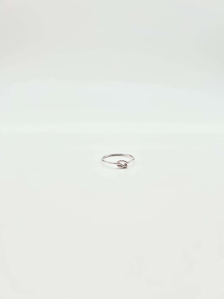 Oath silver ring with knot detail
