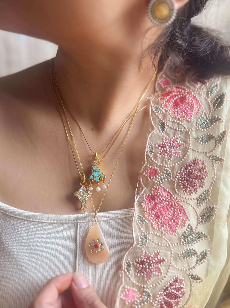 Charvi gold plated neckchain with peacock motif in turquoise