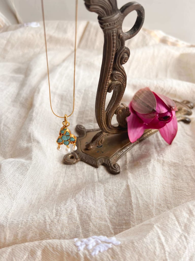 Charvi gold plated neckchain with peacock motif in turquoise