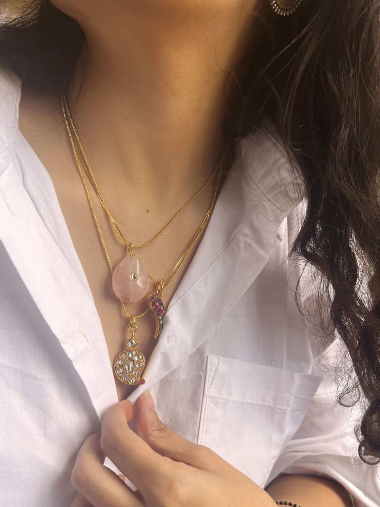 Dhuni gold plated neckchain with parrot motif in kundan