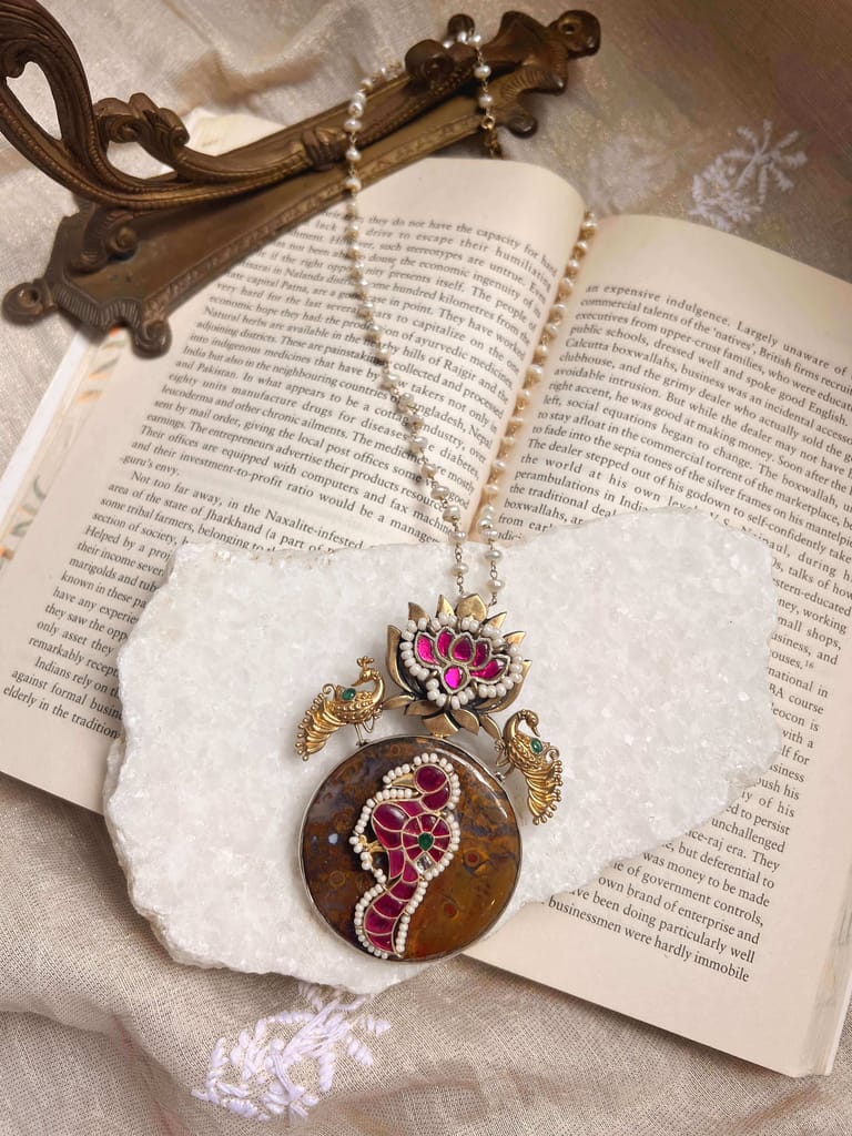 Raga gold plated silver pendant with kundan work and pearl chain