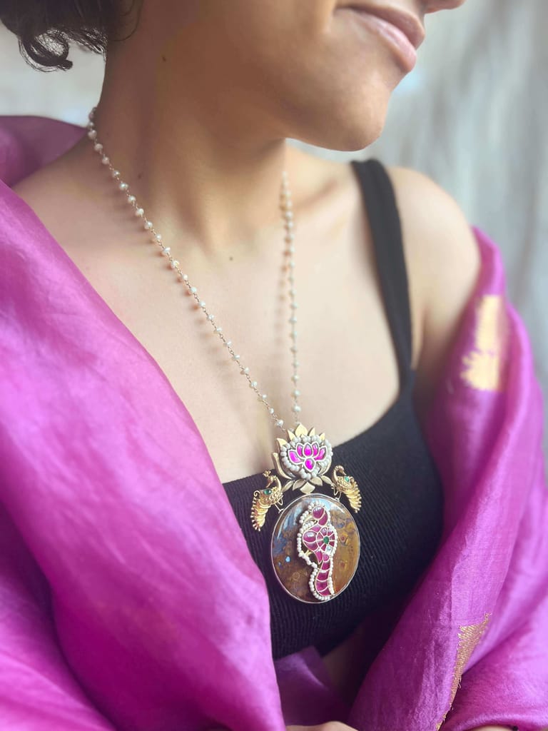 Raga gold plated silver pendant with kundan work and pearl chain