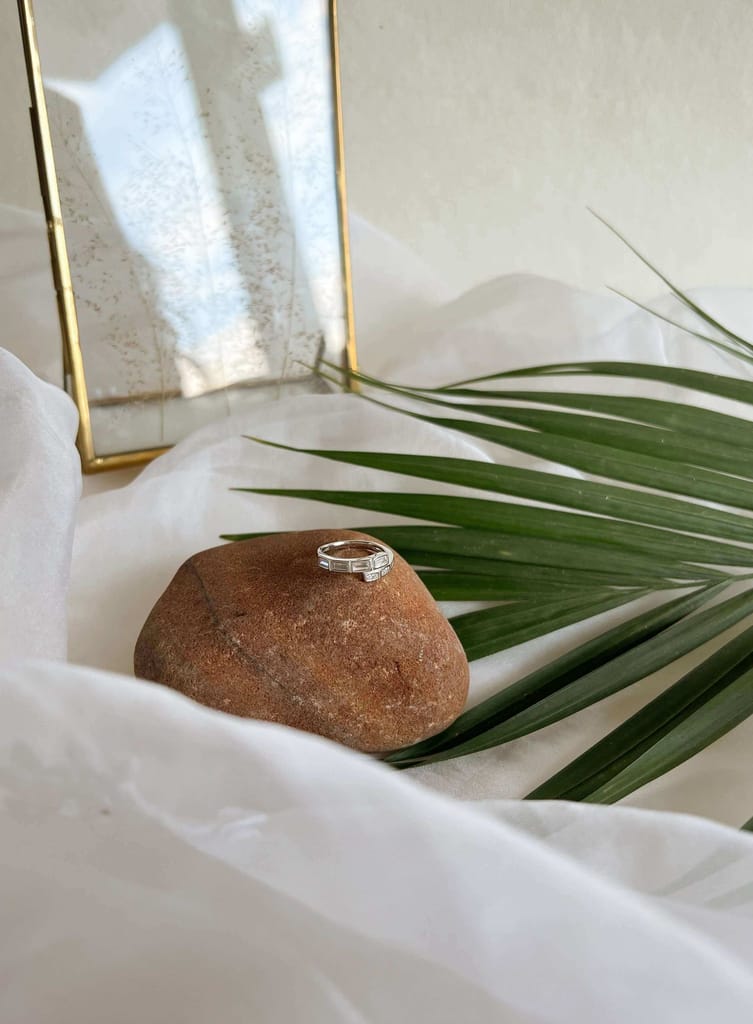 Freya silver ring with cross over detail in zircon