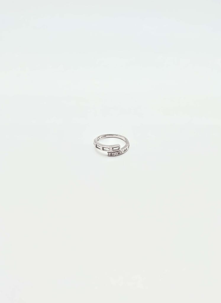Freya silver ring with cross over detail in zircon
