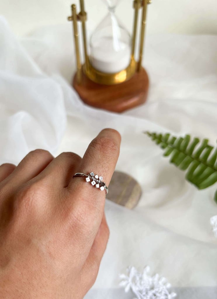 Elara sterling silver ring with hanging cube motif with zircon