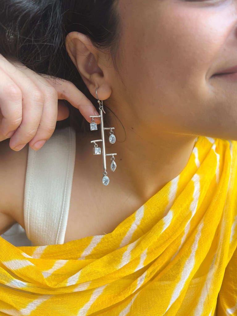 Shrinkhla danglers in silver with zircon charms