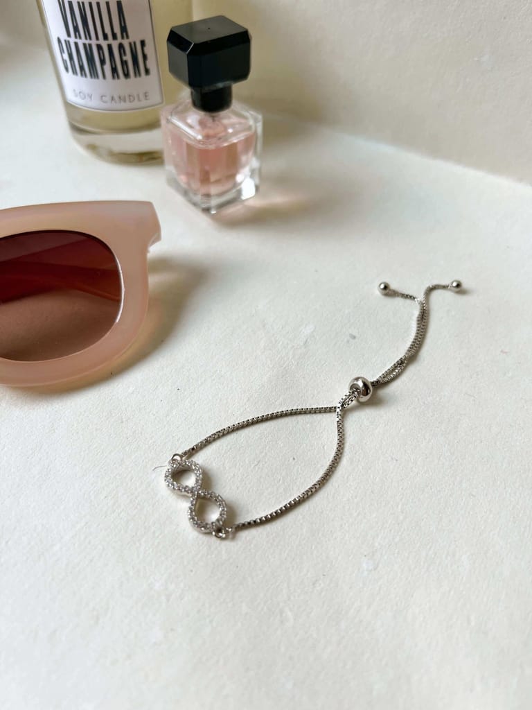 Infinity silver bracelet with zirconia