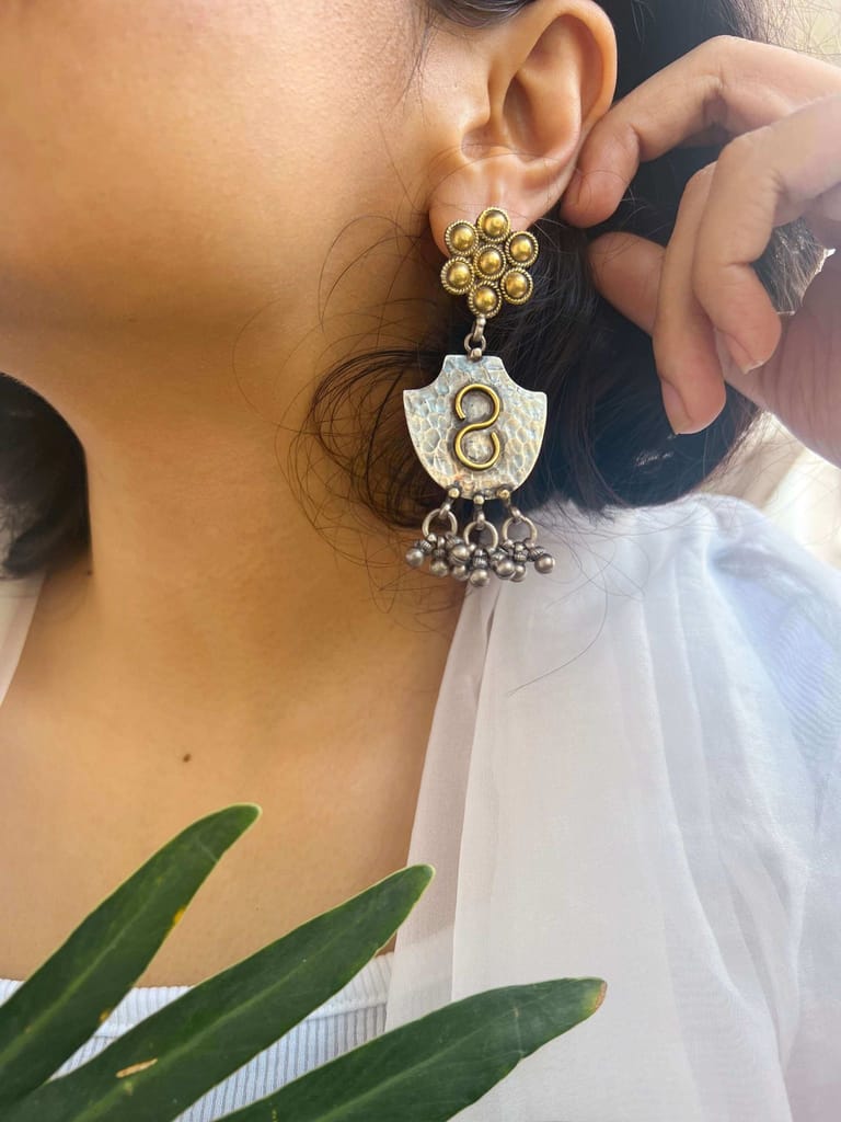 Raksha dual tone earrings with ghunghroo detail