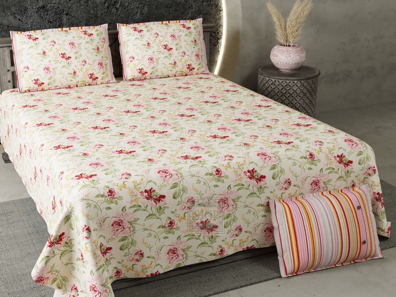 Shades of pastel peach and pink allover floral print on double bedsheet