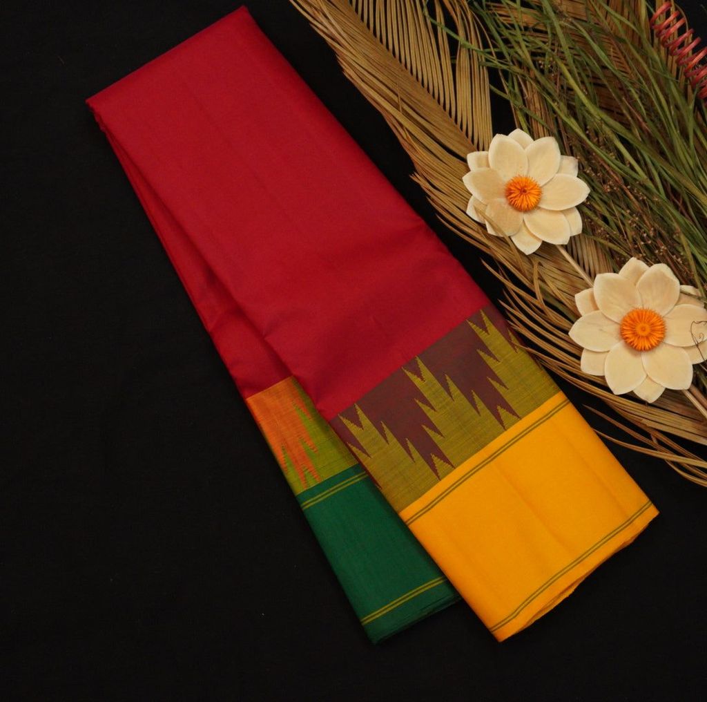Radiant Cherry Red Kanchipuram Silk Saree with Ganga Jamuna Korvai Border
