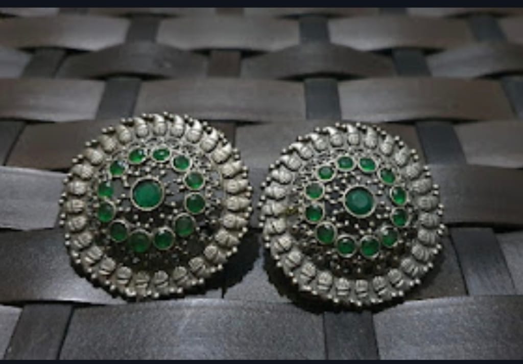 Glamvila Green Stone German Silver Stud - Earrings | Buy online on ZillyBuy