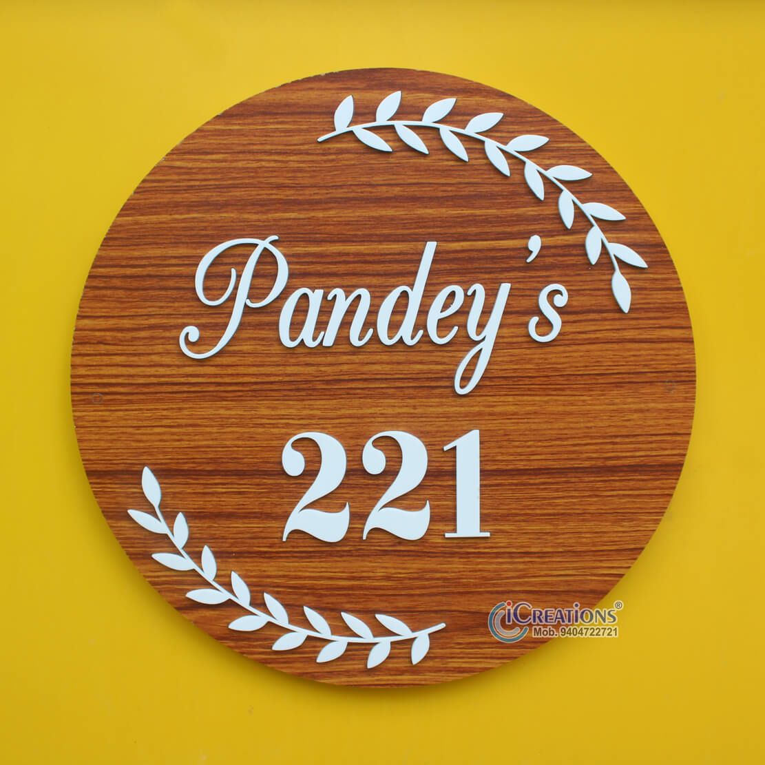 iCreations Customizable Round Home Nameplate with Acrylic Embossed Letters on Sturdy Plywood