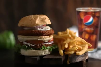 Crumbed Veg Jumbo Burger Meal __ Jumbo Burger,Crispy Fries,Pepsi