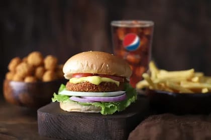Crumbed Veg Burger Meal __ Burger + Crispy Fries,Jalepeno Poppers 100gms,Pepsi