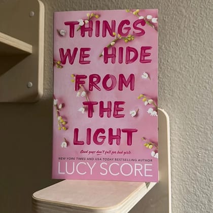 Illuminate the Shadows with "Things We Hide From The Light" by Lucy Score - Paperback Edition