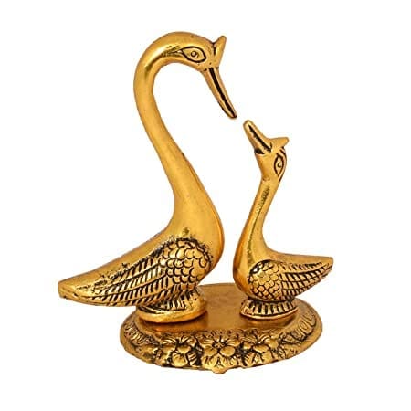 Enhance Your Home Decor with Exquisite Metal Bird Showpieces: Kissing Ducks, Love Birds, and Swans in Shimmering Golden, Silver, and Aluminium Finishes.