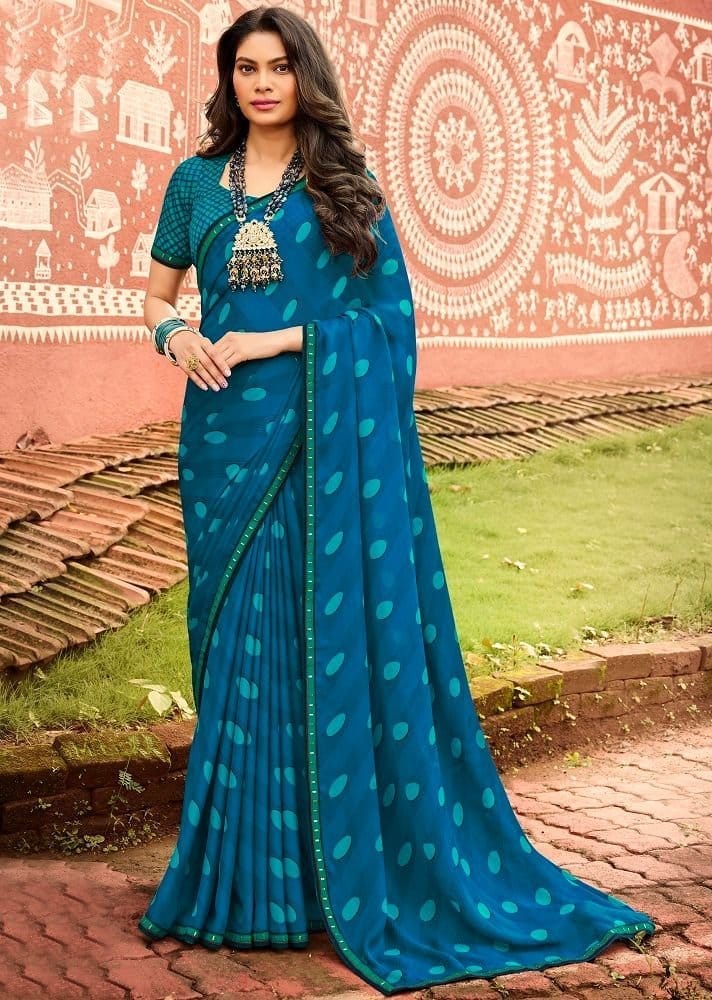 Blue Color Georgette Saree With Fancy Border And Raw Silk Blouse Piece - Sarees | Buy online on ZillyBuy