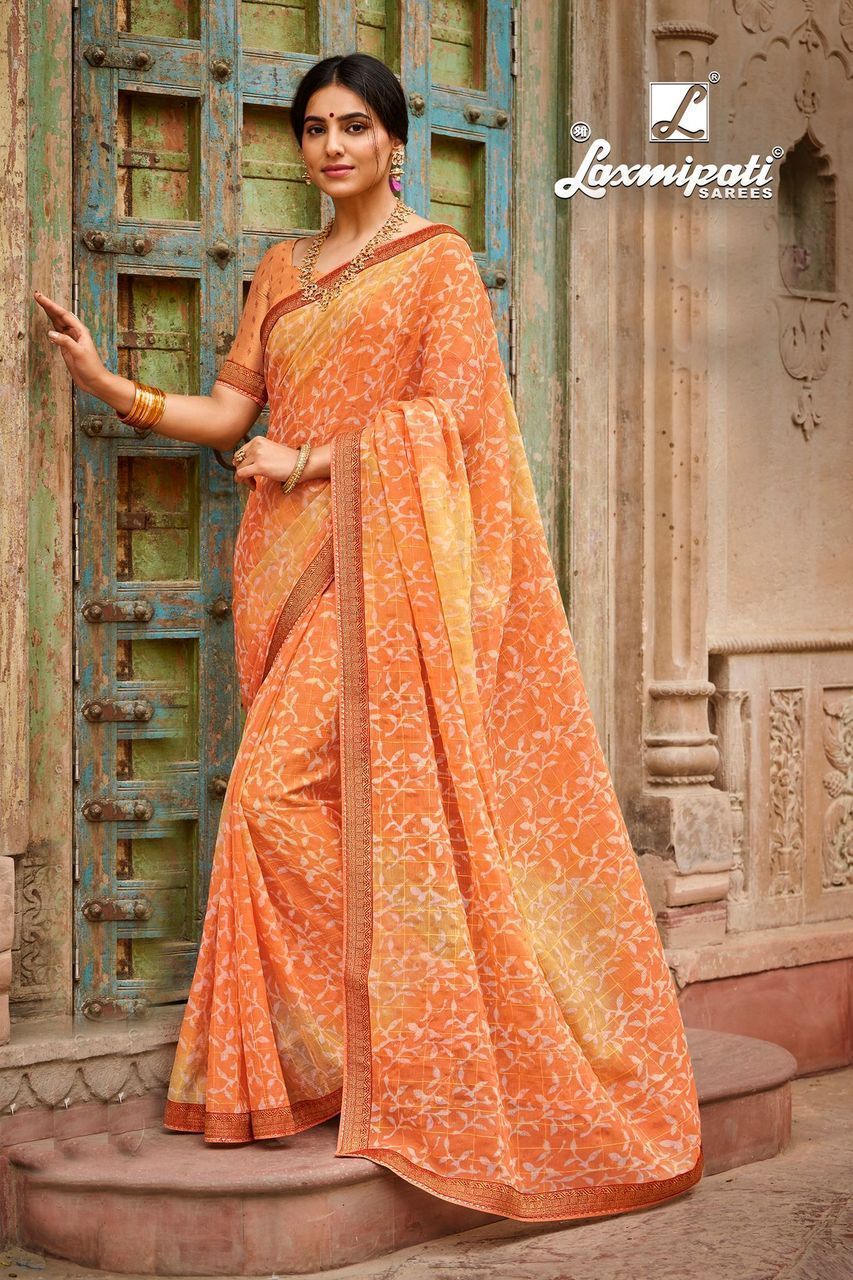 Laxmipati Orange Chiffon Fabric Printed Saree With Fancy Border And Fancy Blouse Piece