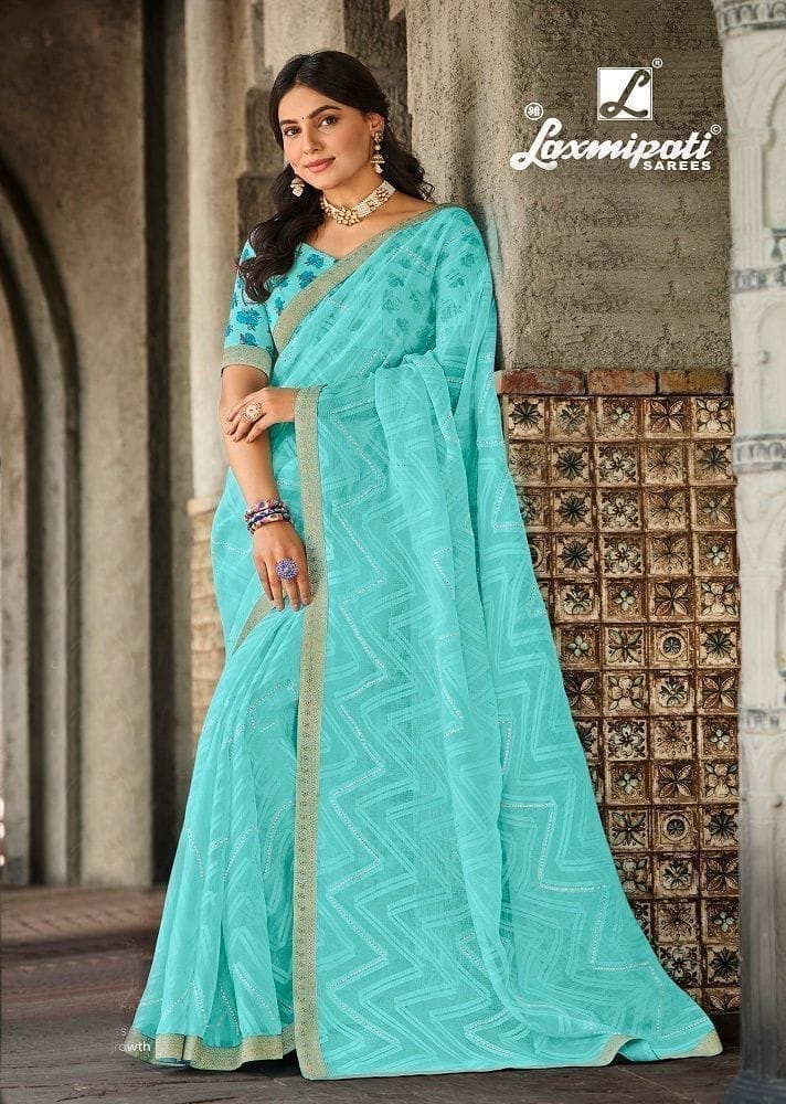 Blue Color Stone Work Brasso Printed Saree With Fancy Border And Fancy Blouse Piece