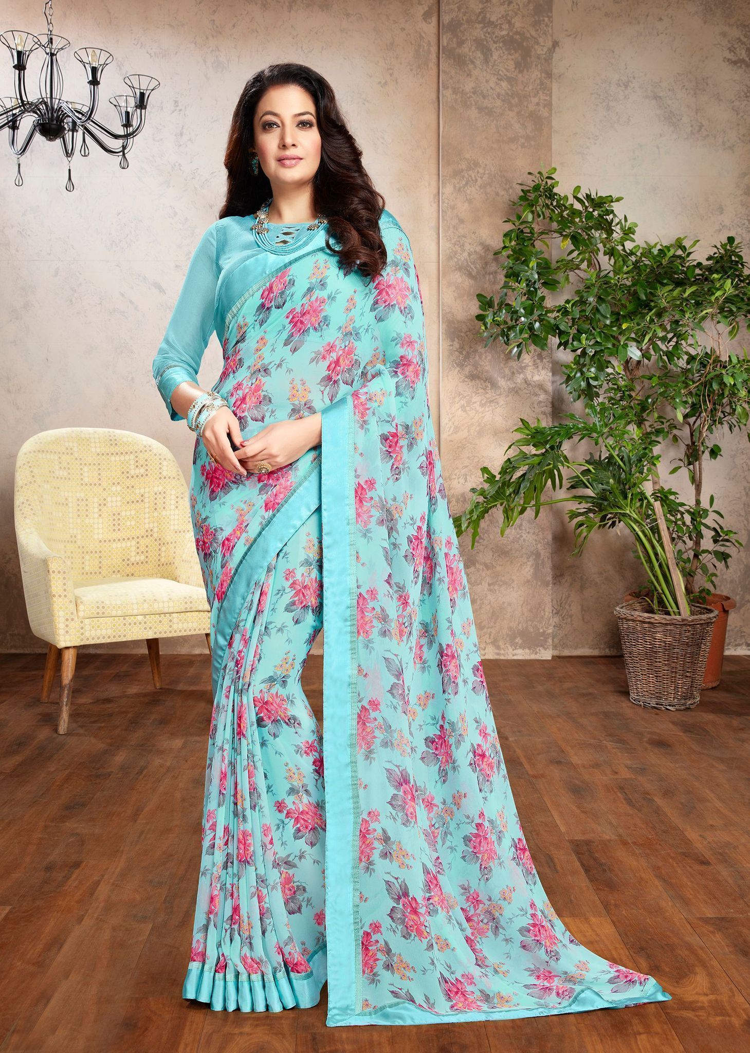 Blue Color Georgette Fabric Printed Saree With Fancy Border And Fancy Blouse Piece