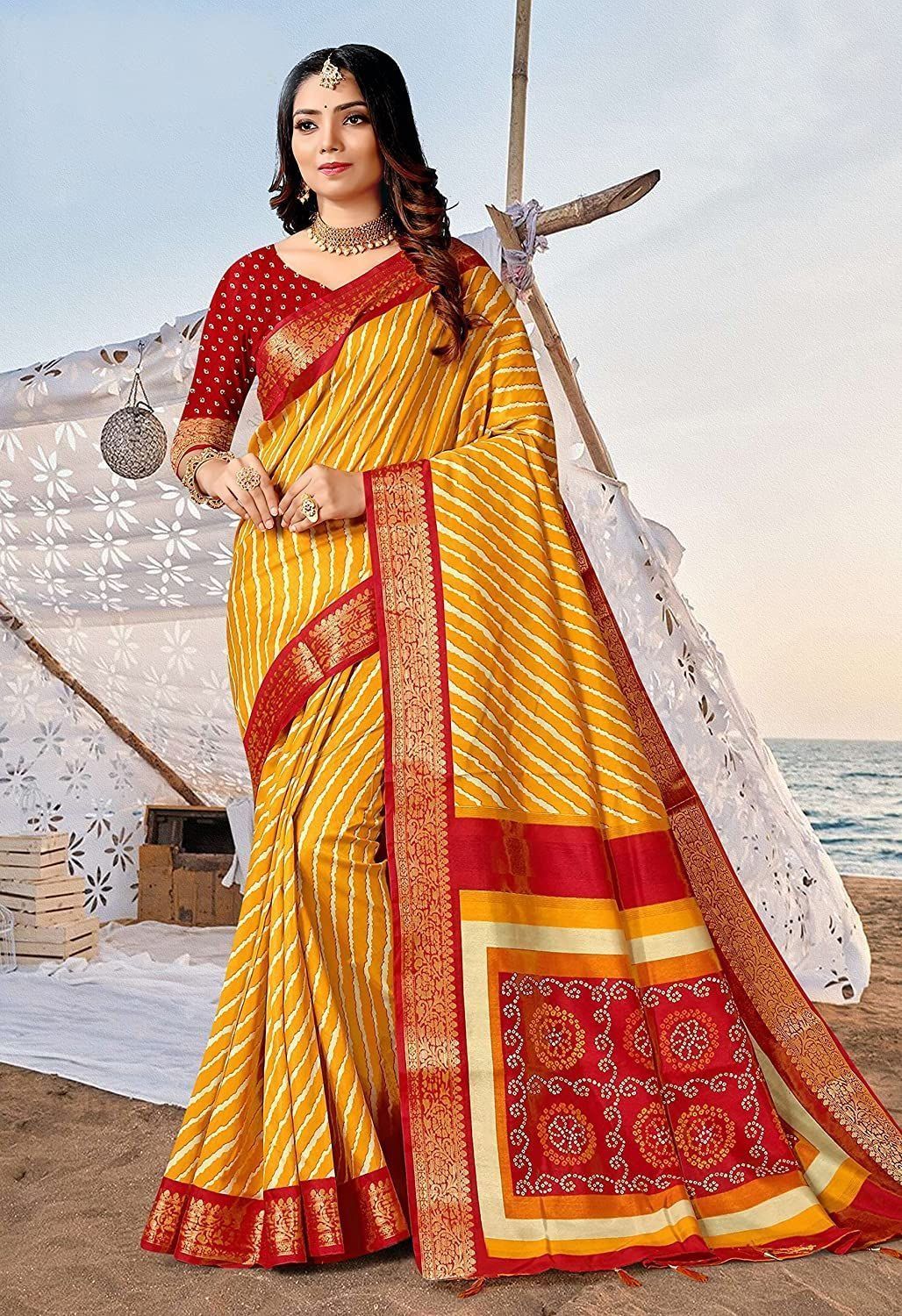 Vipul Mustard Gorgeous Party Wear Beautiful Leheriya Print SILK SAREES With Woven Border Tassal Pallu And Red Fancy Woven Blouse Material .