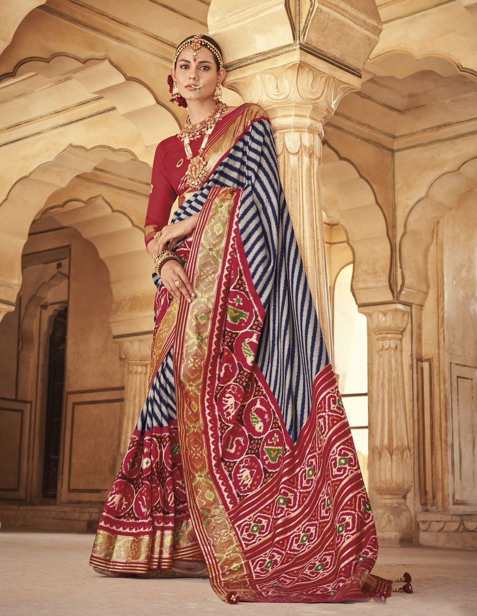 Vipul Multicolor Patola Special SILK SAREES With Value Addition On Pallu Also And red Fancy Print Blouse Material.