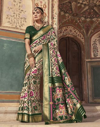 Vipul Multicolor Patola Special SILK SAREES With Value Addition On Pallu Also And Green Fancy Print Blouse Material.