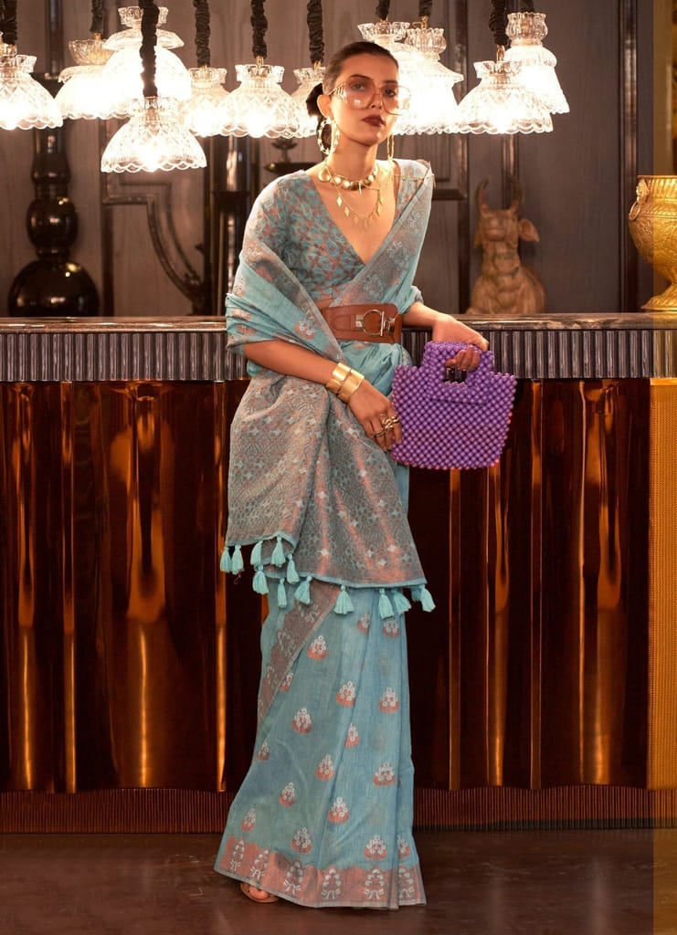 Turquoise Color Linen Fabric Copper Zari Woven Saree With Border Tassal Pallu And Fancy Blouse Piece - Sarees | Buy online on ZillyBuy