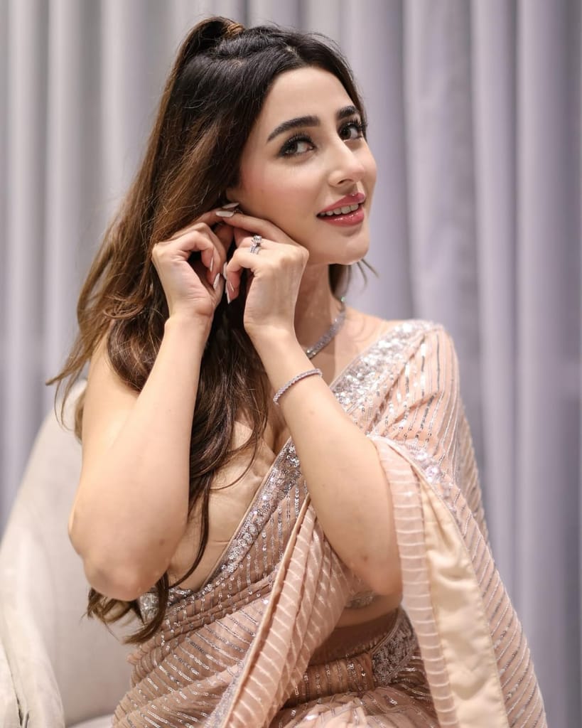 Women's Peach Georgette Embellished Saree with Unstitched Blouse