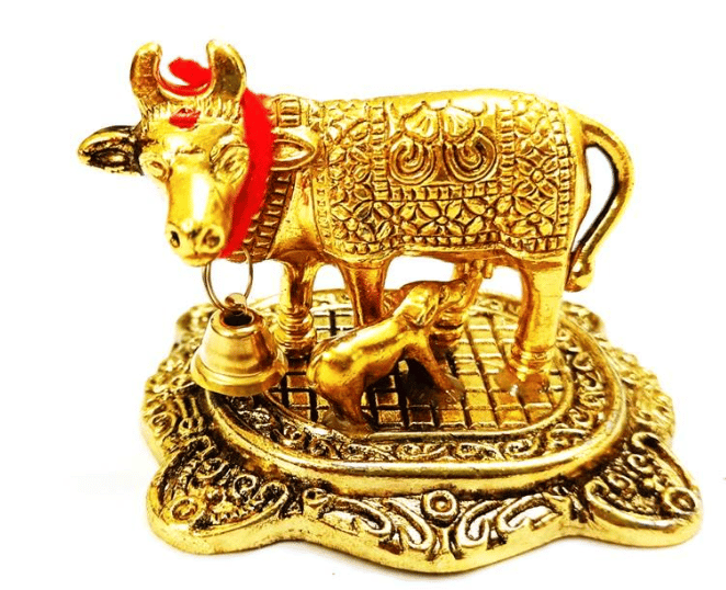 Ayushmann Traders Presents Gold Plated Metal Handicraft Kanha Ji Cow for Home Decor - Pooja Needs | Buy online on ZillyBuy