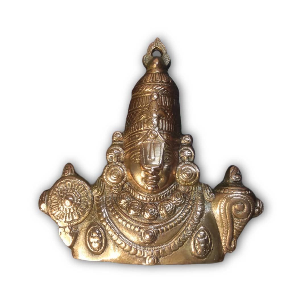 Balaji god idol Craft Handmade Metal murti on the wall.