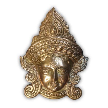 Durga mataji face god idol Metal murti Status on the wall.