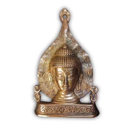 Buddha back leaf God idol Metal murti status on the wall.