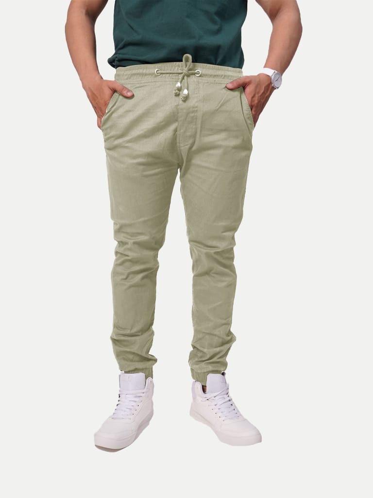 Men Beige Solid Elasticated Joggers - Joggers | Buy online on ZillyBuy