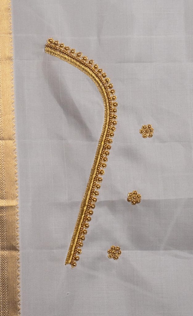White Saree With Golden Zari Embroidery