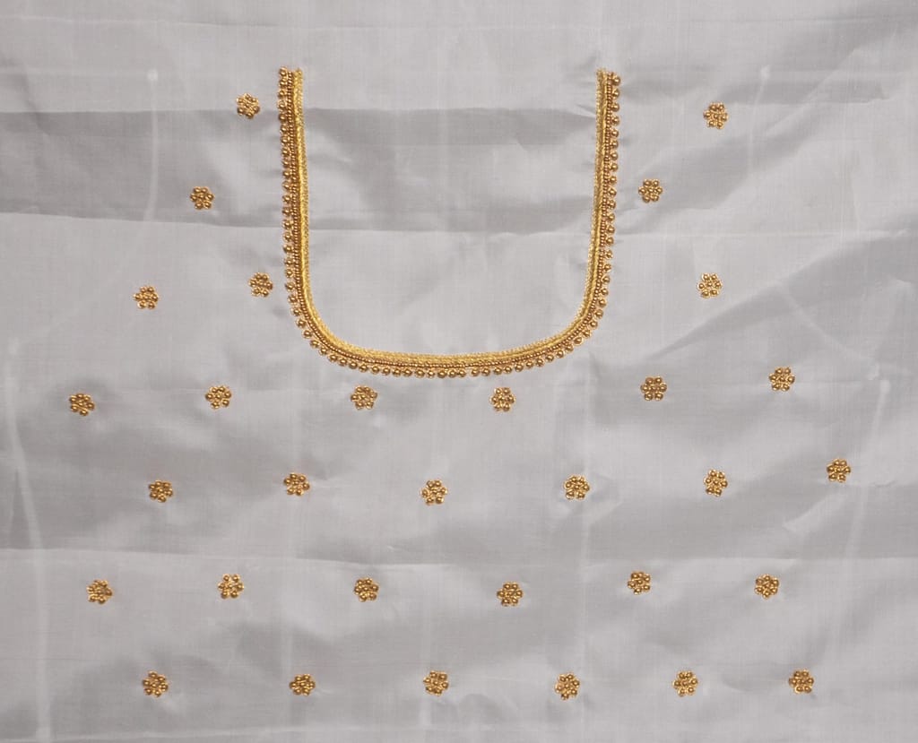 White Saree With Golden Zari Embroidery